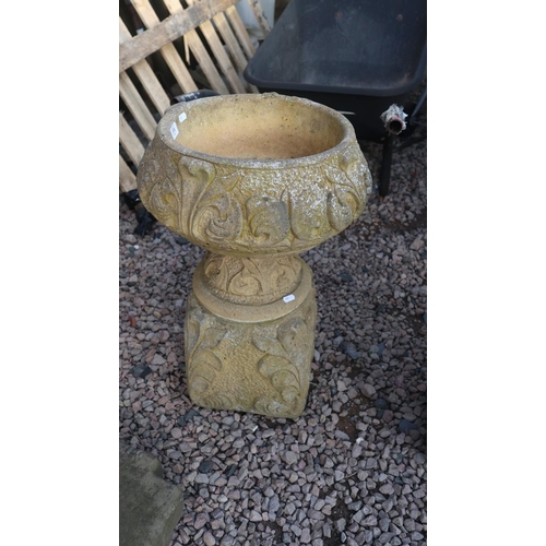 518 - Pair of round stone planters on plinths - Approx height: 65cm