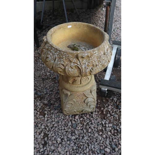 518 - Pair of round stone planters on plinths - Approx height: 65cm