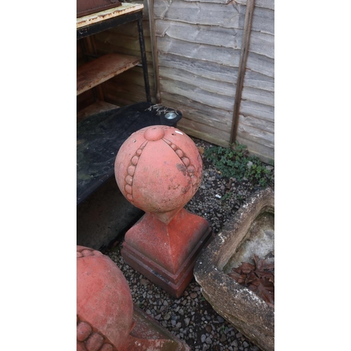 533 - Pair of terracotta orb finials - Approx height: 71cm