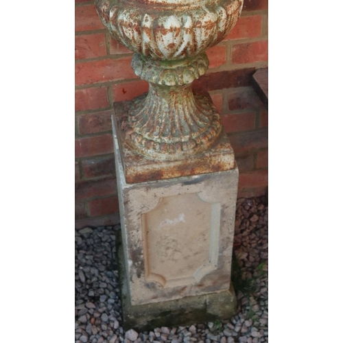 538 - Pair of Victorian cast iron planters on stone plinths - Approx height: 127cm