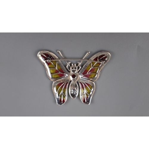 62 - Silver enamel and garnet set butterfly brooch