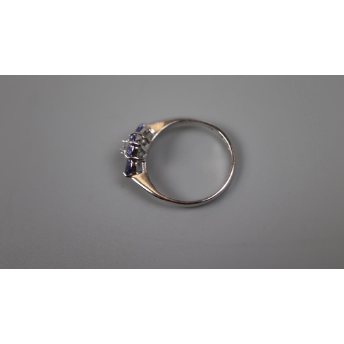 80 - 9ct white gold tanzanite and diamond set ring - Size: P