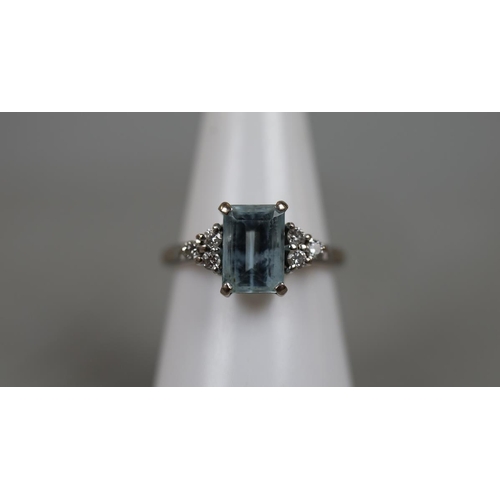 11 - 18ct white gold diamond and aquamarine ring - Size M½