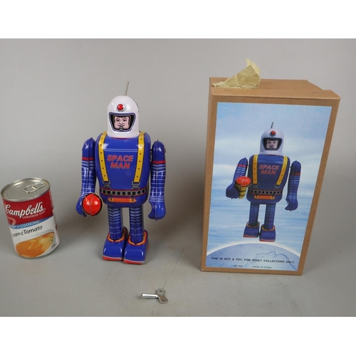 180 - Space man tin plate toy