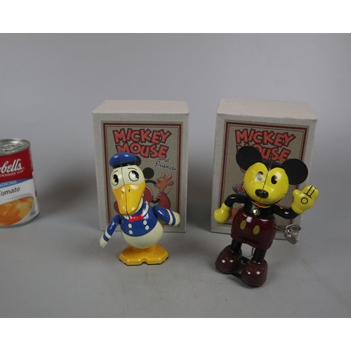 181 - 2 Micky Mouse and friends tin plate toys