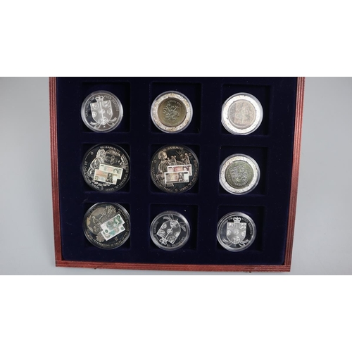 62 - Collectors coins in display case