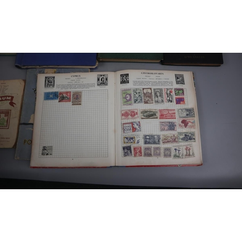 148 - Stamps - Collection of populated stamp albums