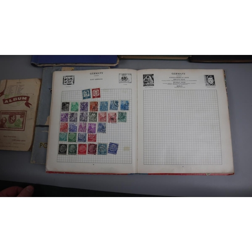 148 - Stamps - Collection of populated stamp albums