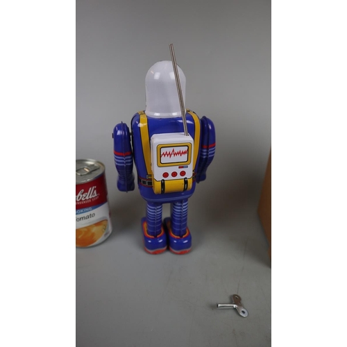 180 - Space man tin plate toy