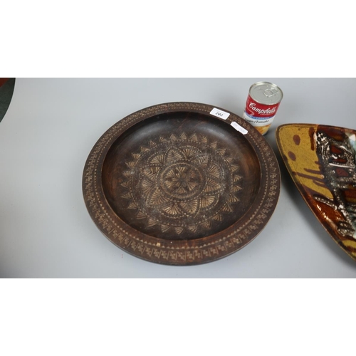 202 - Studio pottery plate together with carved wooden bowl