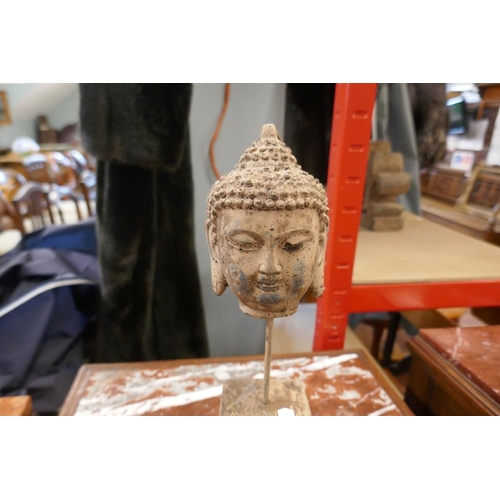 243 - Stone Buddha on plinth