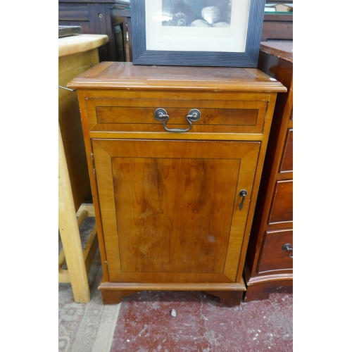 344 - Yew wood serpentine front chest of drawers together with bedside cabinet 