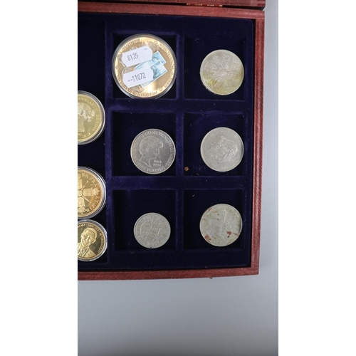 63 - Collectors coins in display case