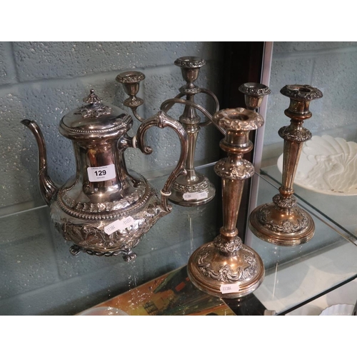 129 - Silver plate candlesticks together with a silver plate teapot