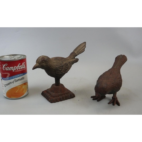 141 - 2 cast iron bird figurines