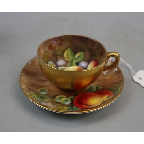 145 - Hand painted Royal Worcester tea cup and saucer