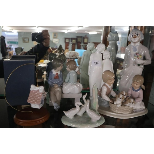 194 - Collection of Lladro figurines together with Royal Doulton sisters figurine