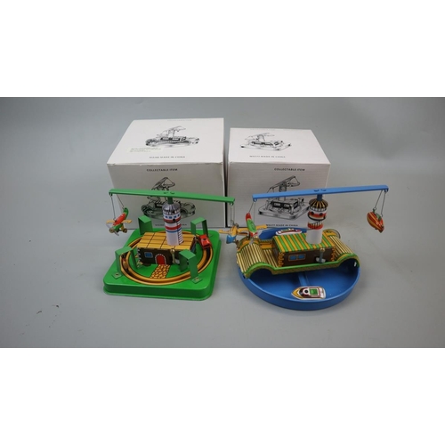 205 - 2 wind up tin plate toys