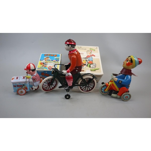 206 - 3 wind up tin plate toys