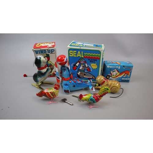 207 - Collection of tin plate toys - animals