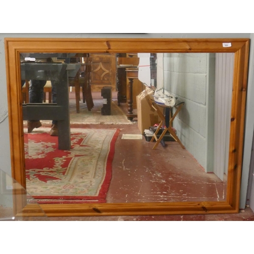 300 - Pine framed bevelled glass mirror