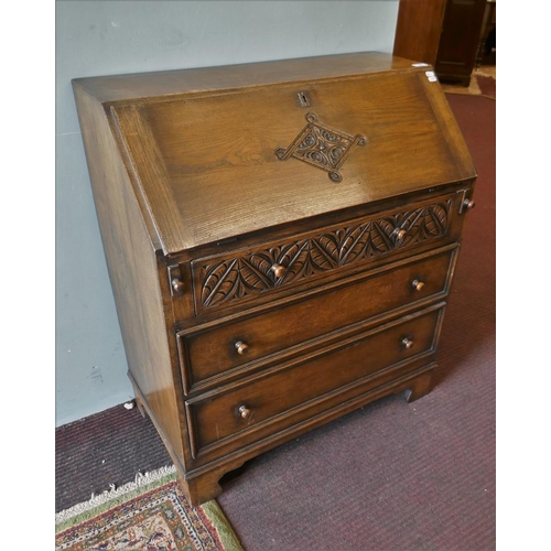 366 - Carved oak bureau