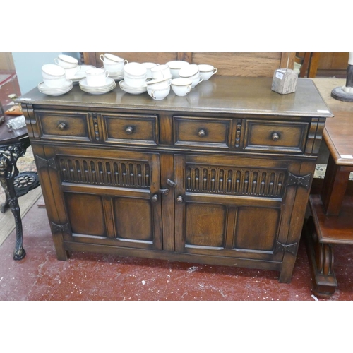 393 - 'Maples' oak dresser base - Approx size: W: 123cm D: 44cm H: 88cm