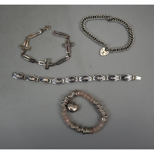 63 - 4 silver bracelets