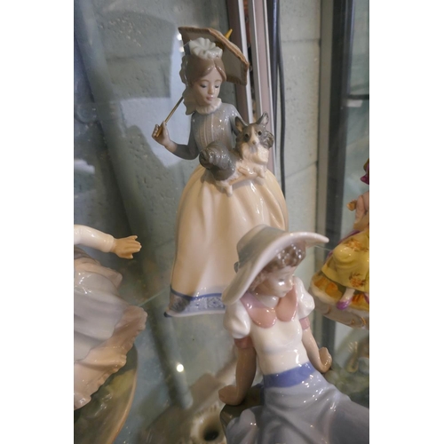 143 - Collection of figurines to include Lladro & Nao