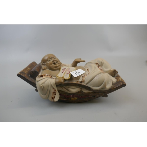 184 - Signed Chinese mud man - Buddha on rocking chair