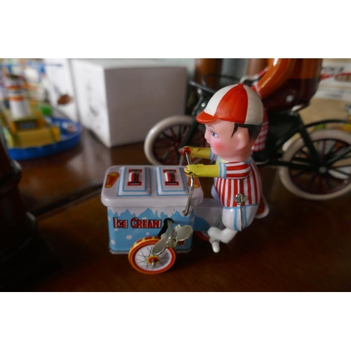 206 - 3 wind up tin plate toys