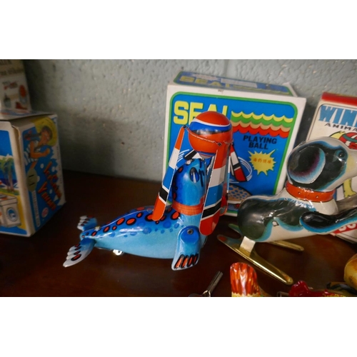 207 - Collection of tin plate toys - animals