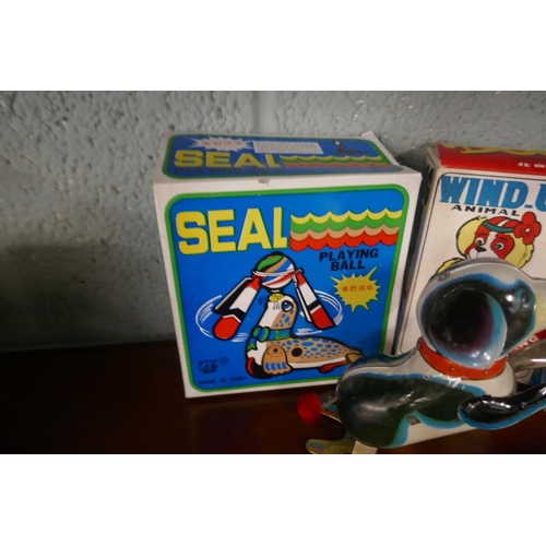 207 - Collection of tin plate toys - animals