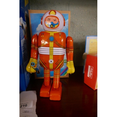 210 - 2 tin plate spaceman toys