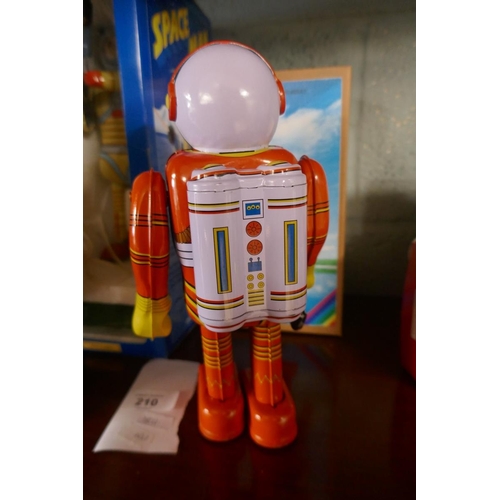 210 - 2 tin plate spaceman toys