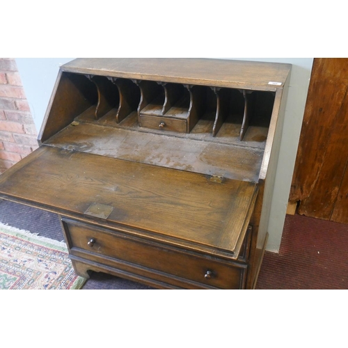 366 - Carved oak bureau