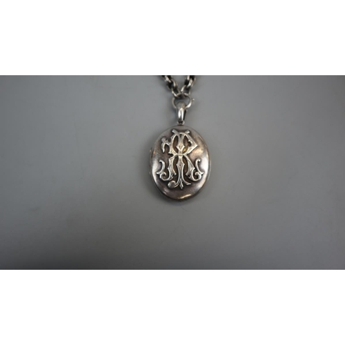 71 - Large silver locket on chain