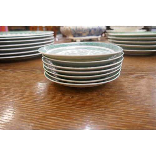 407 - Oriental dinner service adorned with green dragon