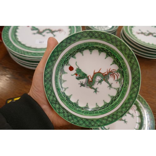 407 - Oriental dinner service adorned with green dragon