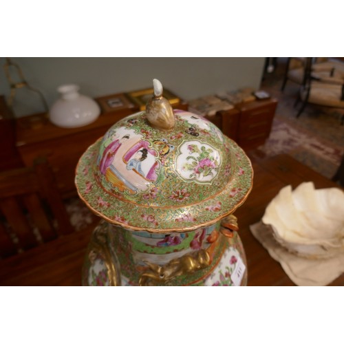 411 - Oriental Famille Rose lidded vase on wooden stand with some restoration - Approx height: 67cm