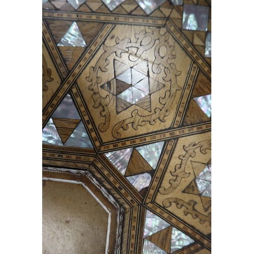 450 - Octagonal Eastern table inlaid with mother-of- pearl
