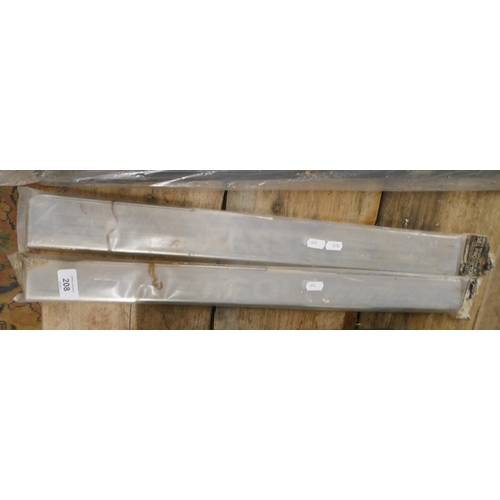 208 - Passat stainless steel sill protectors