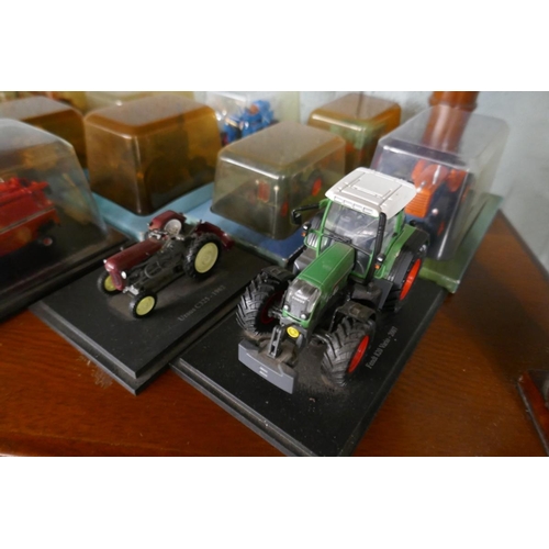 105 - Large collection of miniature tractor models