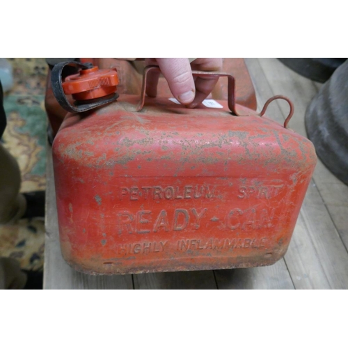 159 - 4 red petrol cans