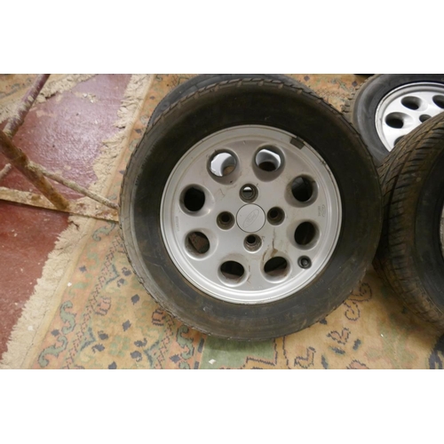 221 - 5 Ford XR3i wheels with tyres