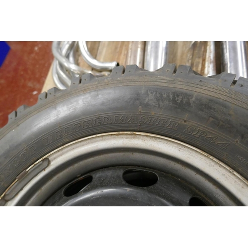 302 - Pair of unused 15 inch steel rims with 2 winter tyres