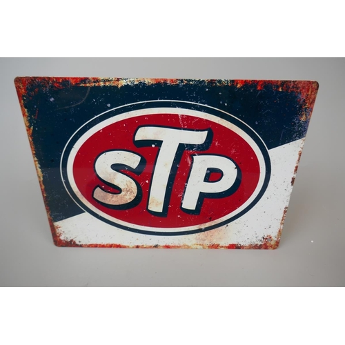 90 - STP sign together with a model car