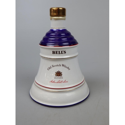 121 - Full Bells Scotch Whiskey in commemorative decanter