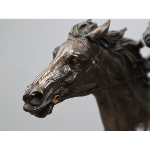 131 - Bronzed figure - John Wayne on horse - Approx height: 26cm