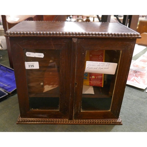 235 - Edwardian glazed oak smokers cabinet with contents